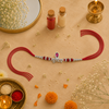 Krishna Rakhi – 925 Sterling Silver Rakhi with Pink Crystal & Red Beads