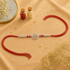 Ram Rakhi – 925 Sterling Silver Ram Symbol Rakhi with Ruby Red Crystal Beads