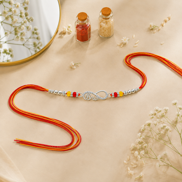Bro Infinity Rakhi – 925 Sterling Silver Infinity Rakhi with Red & Yellow Crystal Beads