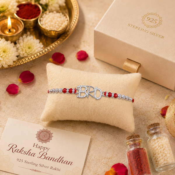 Bro Rakhi – 925 Sterling Silver Letter Rakhi with Red Crystal Beads