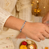 Bro Infinity Rakhi – 925 Sterling Silver Infinity Rakhi with Royal Blue & Sky Blue Crystal Beads