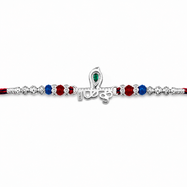 Krishna Rakhi – 925 Sterling Silver Rakhi with Green Crystal & Red Blue Beads