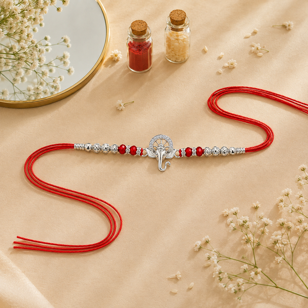 Bal Ganesha Silver Rakhi – 925 Sterling Silver Ganesha Rakhi with Ruby Red Crystal Beads