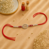 Radhe Radhe Rakhi – 925 Sterling Silver Rakhi with CZ Detailing & Red Thread