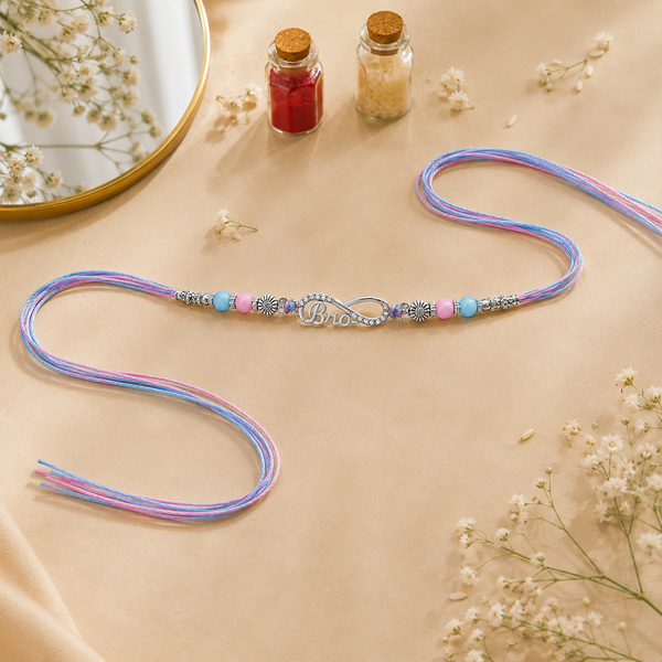 Bro Infinity Rakhi – 925 Sterling Silver Infinity Rakhi with Pastel Blue & Pink Beads