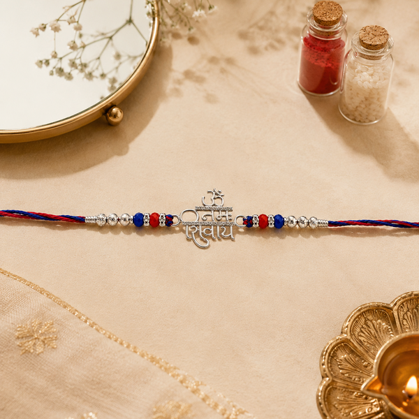 Om Namah Shivay Rakhi – 925 Sterling Silver Spiritual Rakhi with Red & Blue Beads