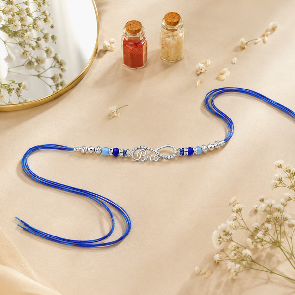 Bro Infinity Rakhi – 925 Sterling Silver Infinity Rakhi with Royal Blue & Sky Blue Crystal Beads