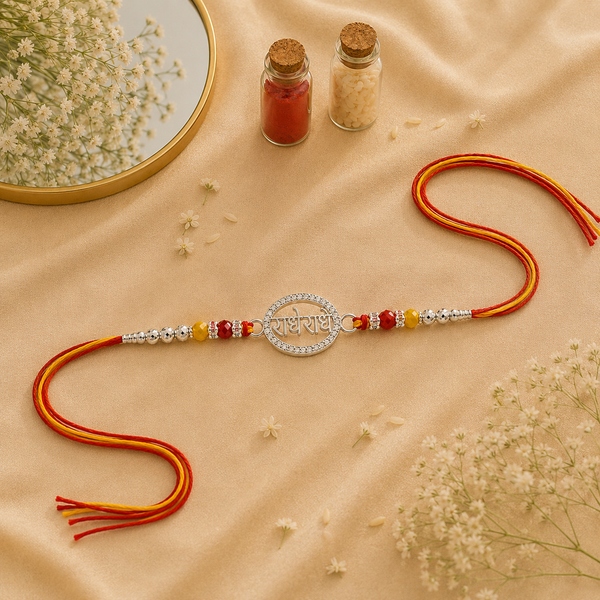 Radhe Radhe Rakhi – 925 Sterling Silver Divine Radhe Radhe Rakhi with Ruby & Golden Crystal Beads