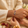 Trishul Crystal Silver Rakhi – 925 Sterling Silver Divine Trishul Rakhi with Red & Blue Crystal Beads