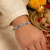 Ram Rakhi – 925 Sterling Silver Ram Symbol Rakhi with Sapphire Blue & Sky Blue Crystal Beads