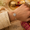 Bal Ganesha Silver Rakhi – 925 Sterling Silver Ganesha Rakhi with Ruby Red & Yellow Crystal Beads