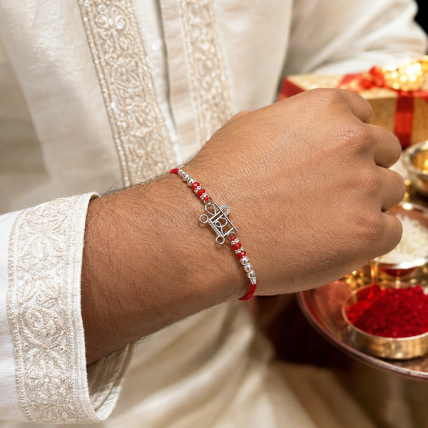 Veera Rakhi – 925 Sterling Silver Name Rakhi with Red Crystal Beads