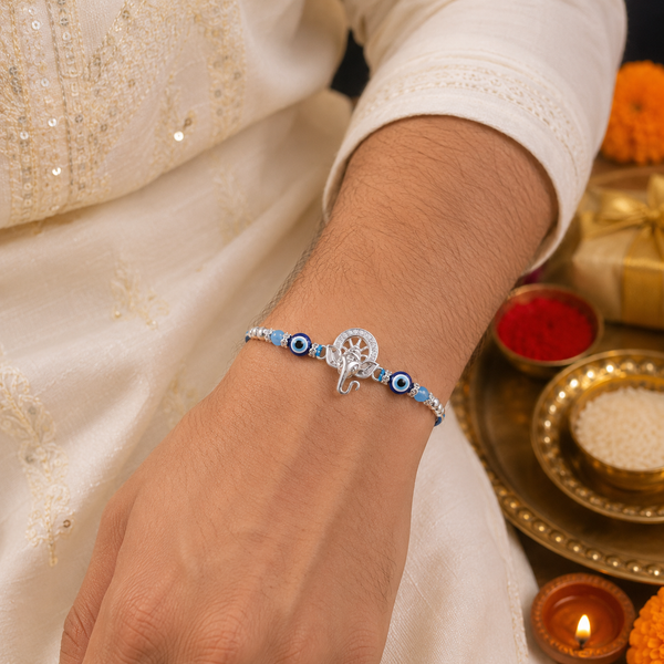Ganesha Kavach Silver Rakhi – 925 Sterling Silver Evil Eye Rakhi with Sky Blue & Royal Blue Beads